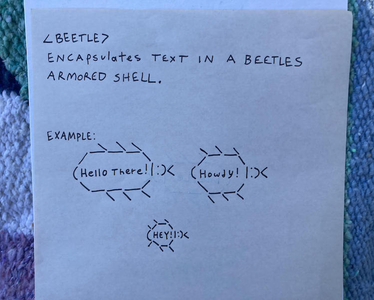 a sheet of origami paper with text describing the beetle element